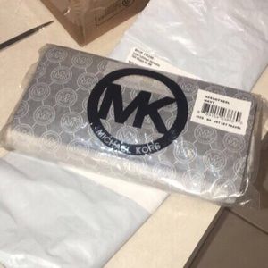 Jet Set Travel Leather Continental Wristlet - New